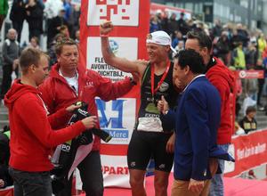 Bart Colpaert of Belgium celebrates winning the men's race during the Challenge Triathlon Almere-Amsterdam on September 14, 2013 in Almere, Netherlands.